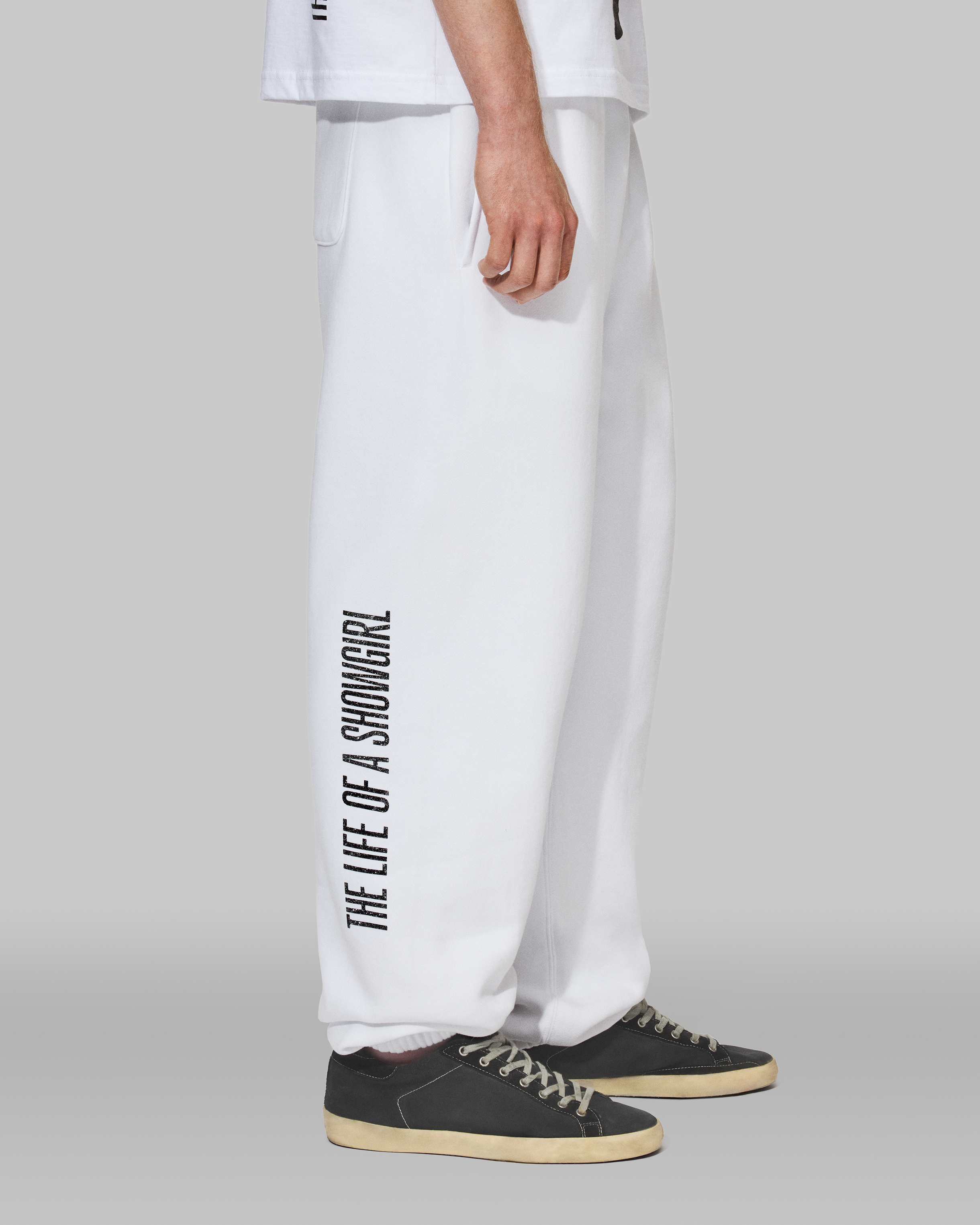 The Life of a Showgirl Shiny Bug White Sweatpants 6