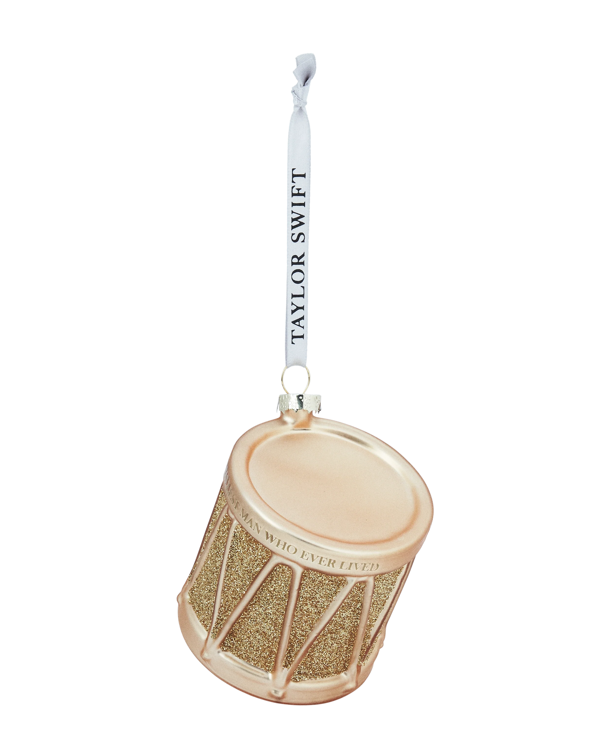 Decorative ornament resembling a drum with glittery design and 'Taylor Swift' branding 