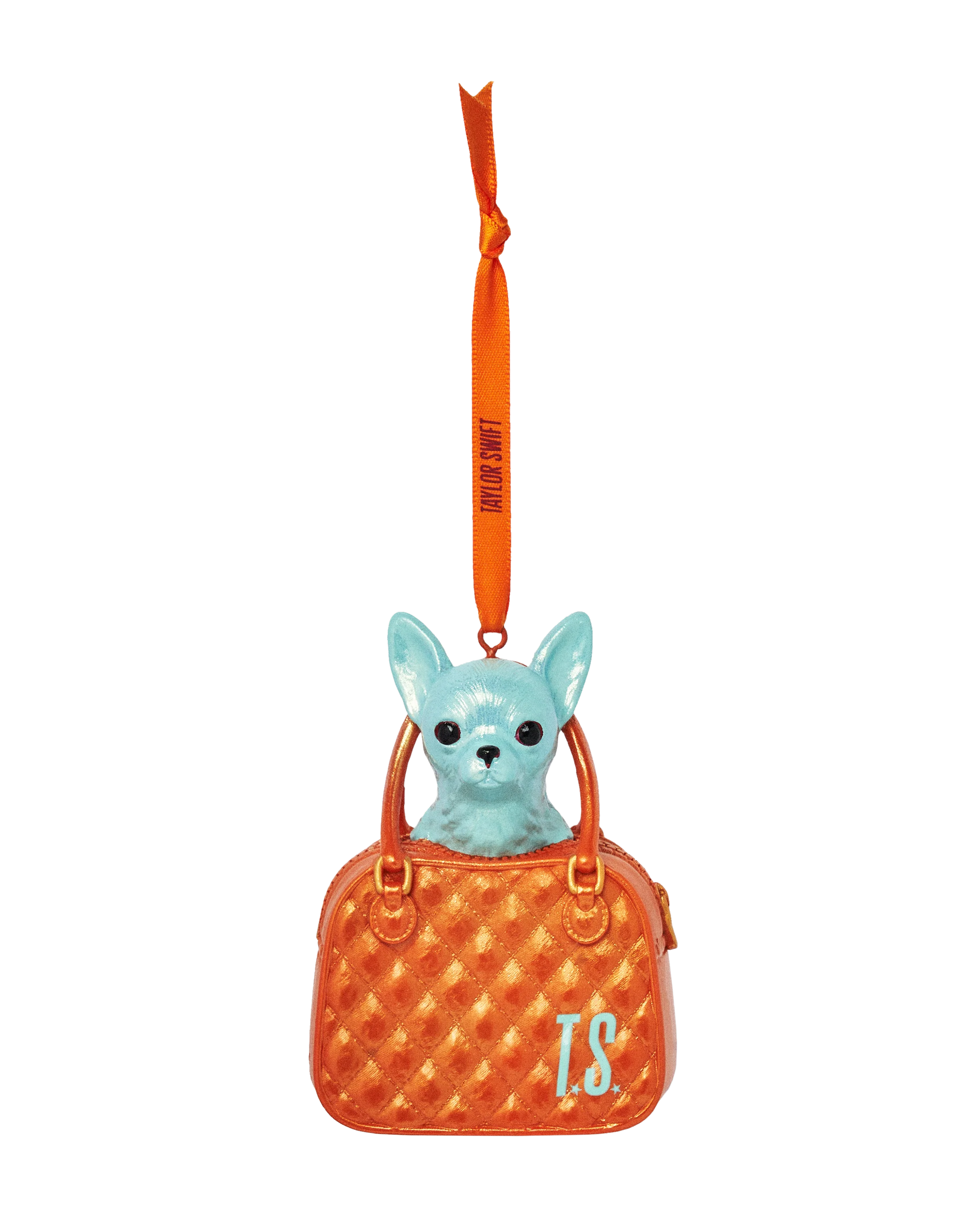 Blue dog figurine in an orange handbag with 'LS' initials ornament