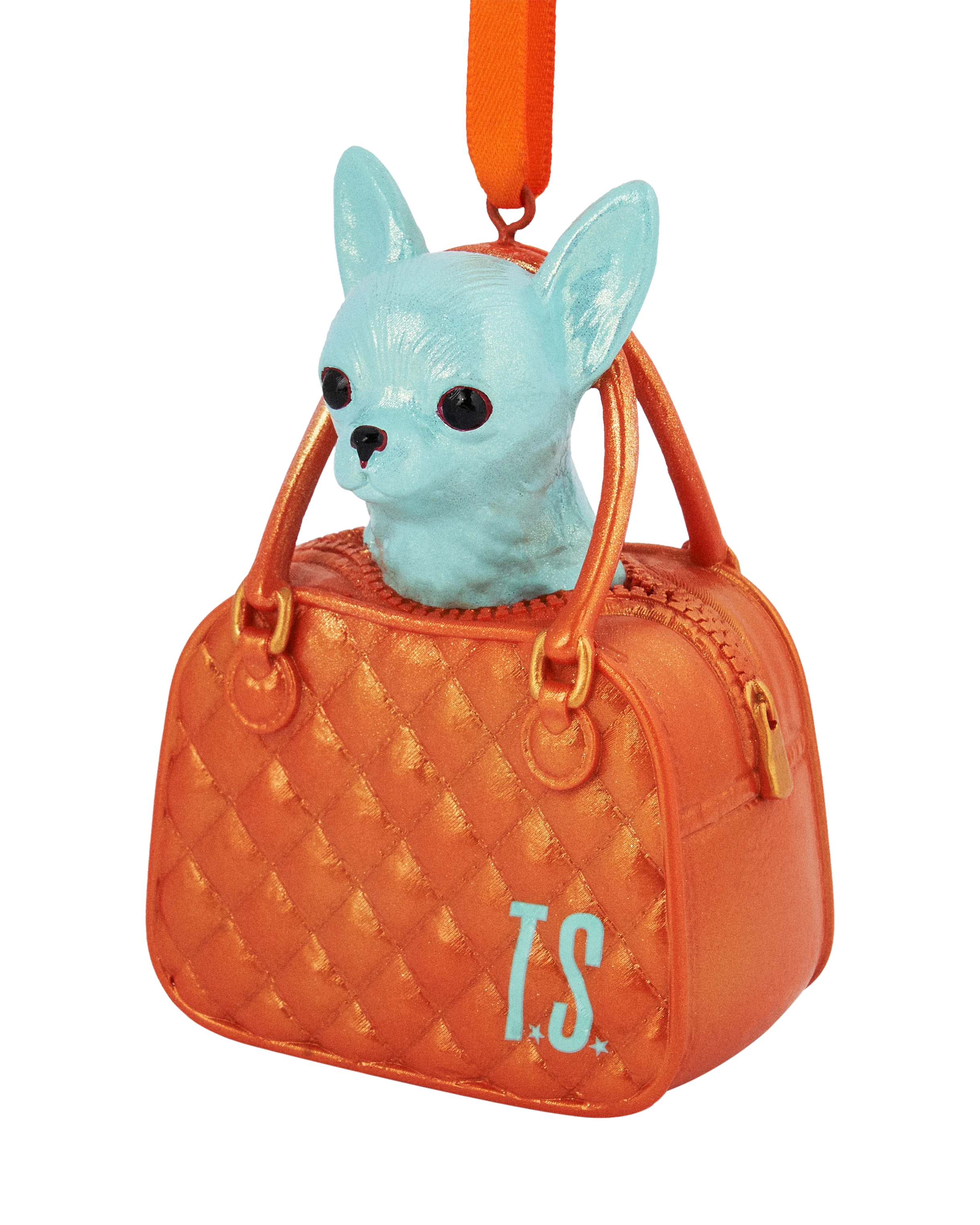 Orange handbag with a turquoise dog figurine on top ornament