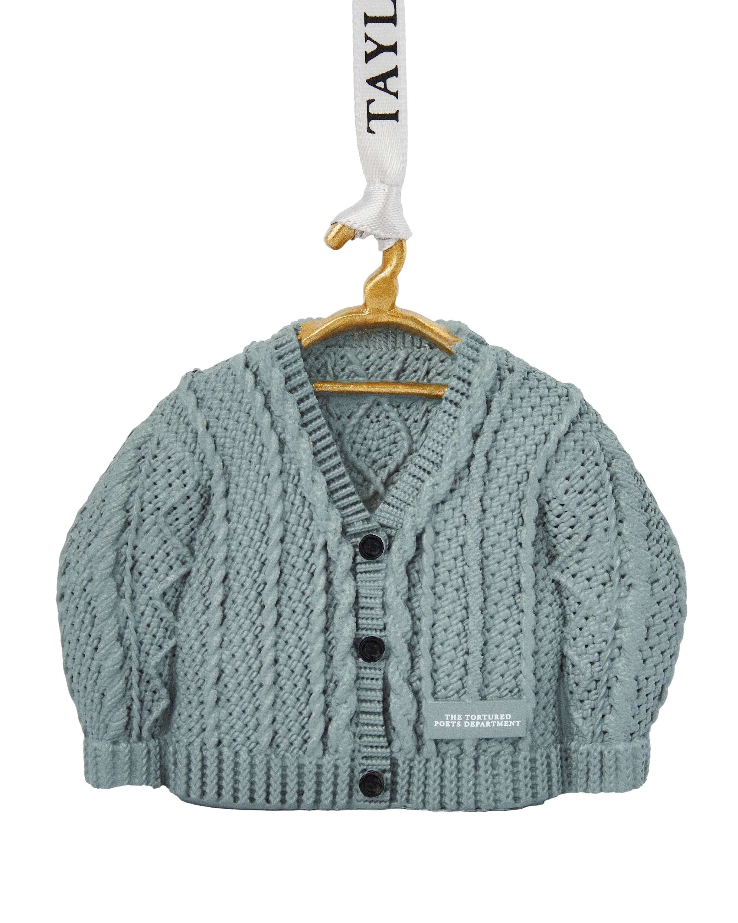 Knitted cardigan on a hanger with a visible brand label ornament