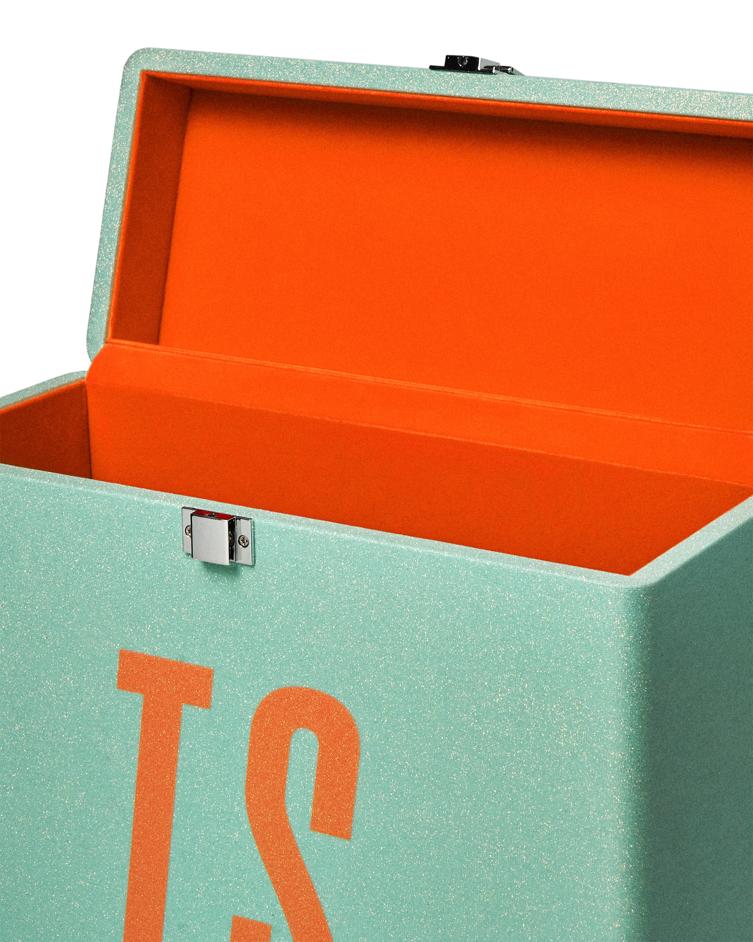 Green and orange storage box with 'TS' branding on a white background
