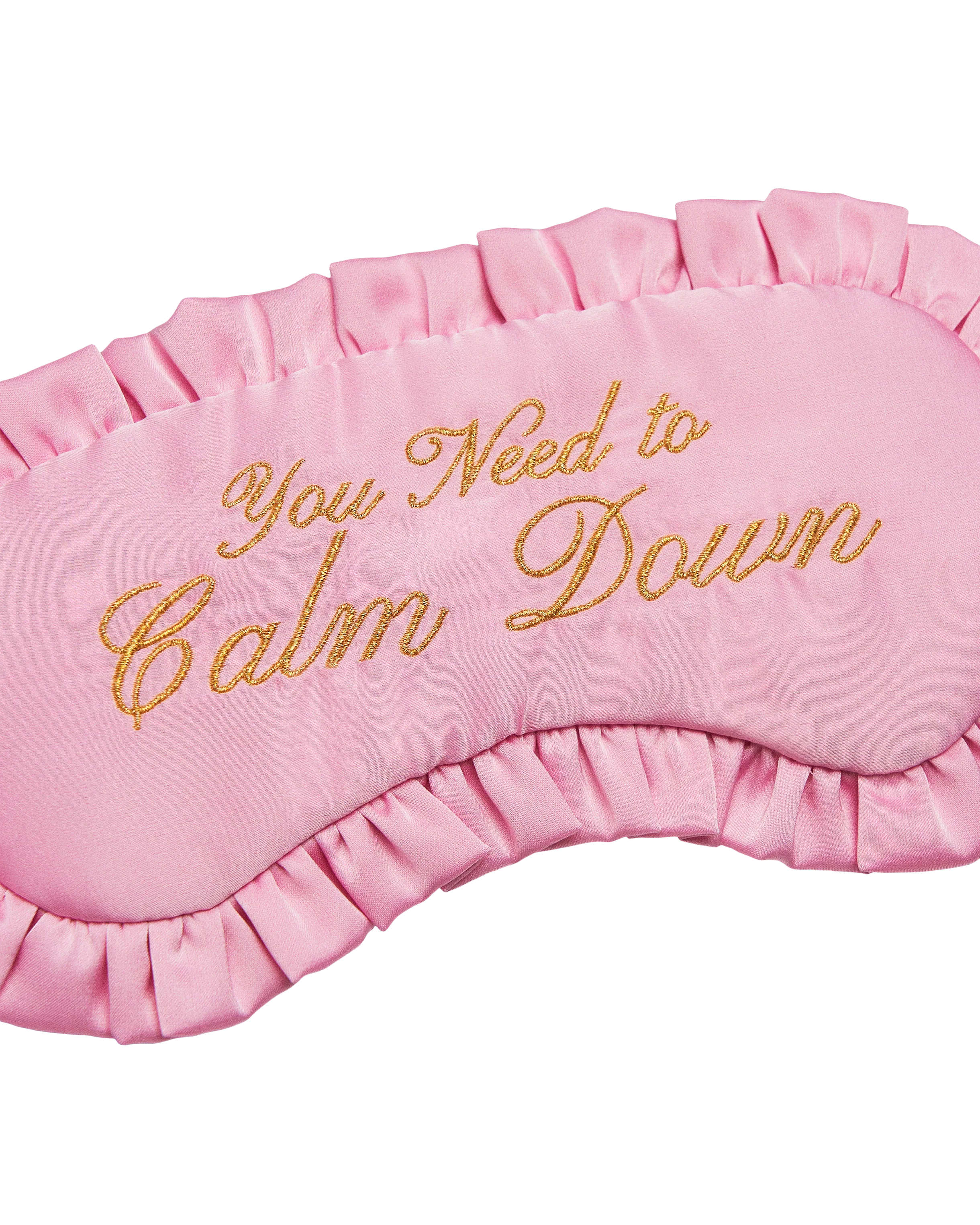 Pink eye mask with gold text 'You Need to Calm Down' 